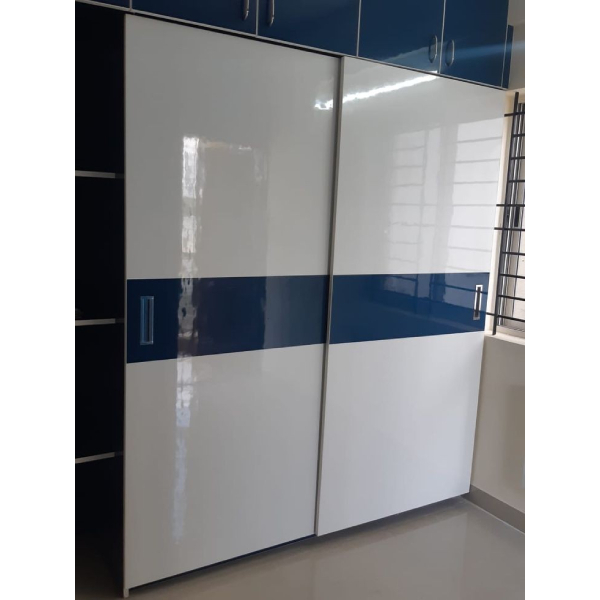 Wooden Sliding Wardrobe in Buddha Nagar, Swastik Interiors