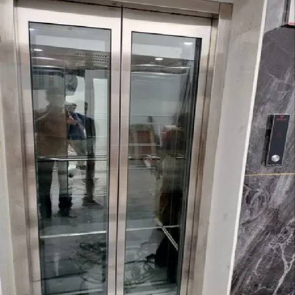 Hydraulic Glass Auto Door Lift in pune Victorjet Lift (OPC) Private