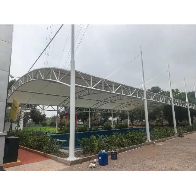 Tensile swimming pool covering structure