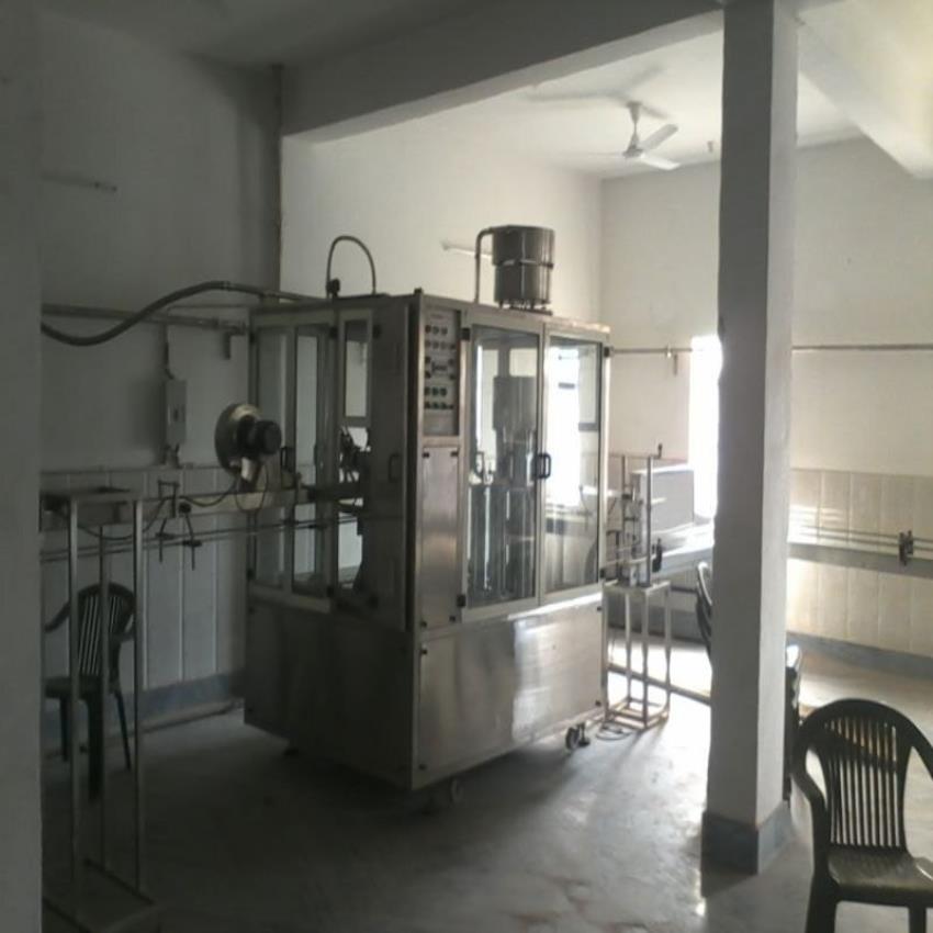 Automatic 800 Bottle Per Hour Bottle Filling Machine
