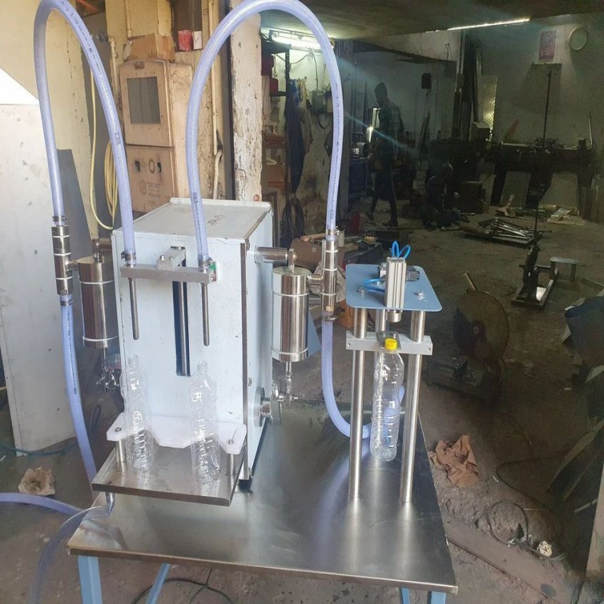 Semi automatic oil bottle filling and capping machine