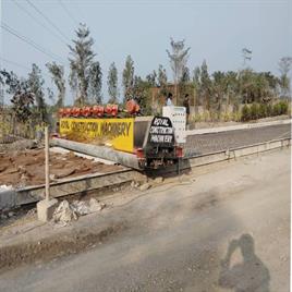 Road paver machine