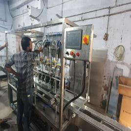 4 Electric Oil Bottle Filling Capping And Sticker Labelling Machine In Tanzania, Capacity: 20 BPM