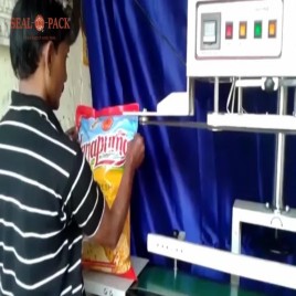 Automatic Head Adjustable Vertical Continuous Band Sealing Machine