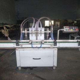 Bottle Filler Automatic Peanuts Oil Packing Machine, Apte, Capacity: 1000 T 2000 Bottle Per Hour