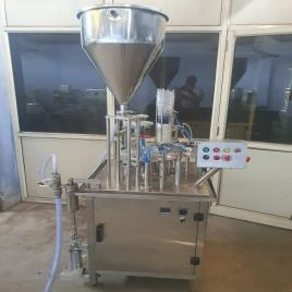 Mate Stainless Steel Automatic Yogurt Filling Machine in Kenya, Capacity: 1000 cups/hour, 5 Kw