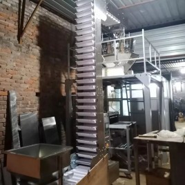 Overlapping Bucket Elevator