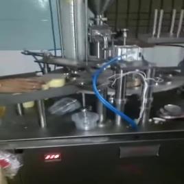 Pack tech Curd Cup Filling And Sealing Machine, Capacity: 20 Cup Per Minute, 2 Hp