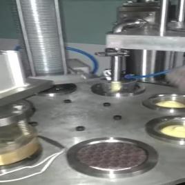 Pack tech Curd Cup Filling And Sealing Machine, Capacity: 20 Cup Per Minute, 2 Hp