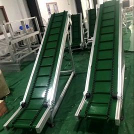 PM Technologies Stainless Steel Inclined Cleated Belt Conveyor, Capacity: Max 1 ton