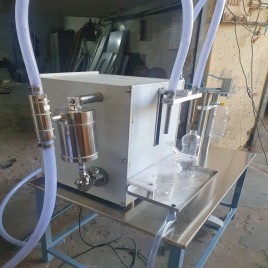 Semi automatic oil bottle filling and capping machine