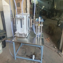 Semi automatic oil bottle filling and capping machine