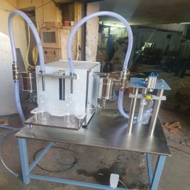 Semi automatic oil bottle filling and capping machine