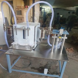 Semi automatic oil bottle filling and capping machine