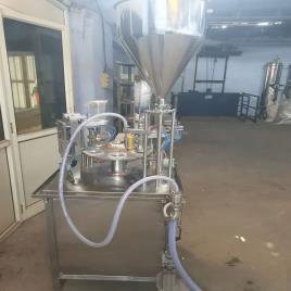 Servo base cup filling and sealing machine