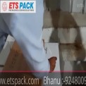 Box Strapping Machine