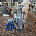 SEW Simple Taper Roller Mild Steel Slat Chain Conveyor, For Packing And Food Industries, Capacity: 50-100 kg per feet