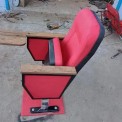 Tip Up auditorium chairs writing table mechanism